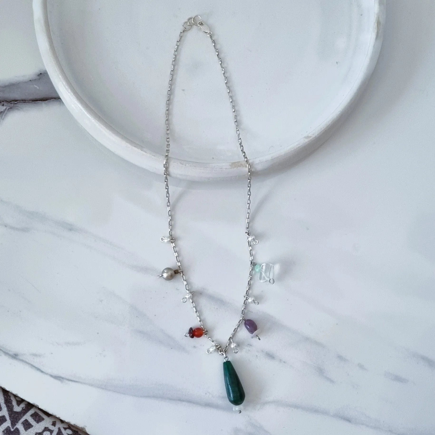 Silver and charms necklace