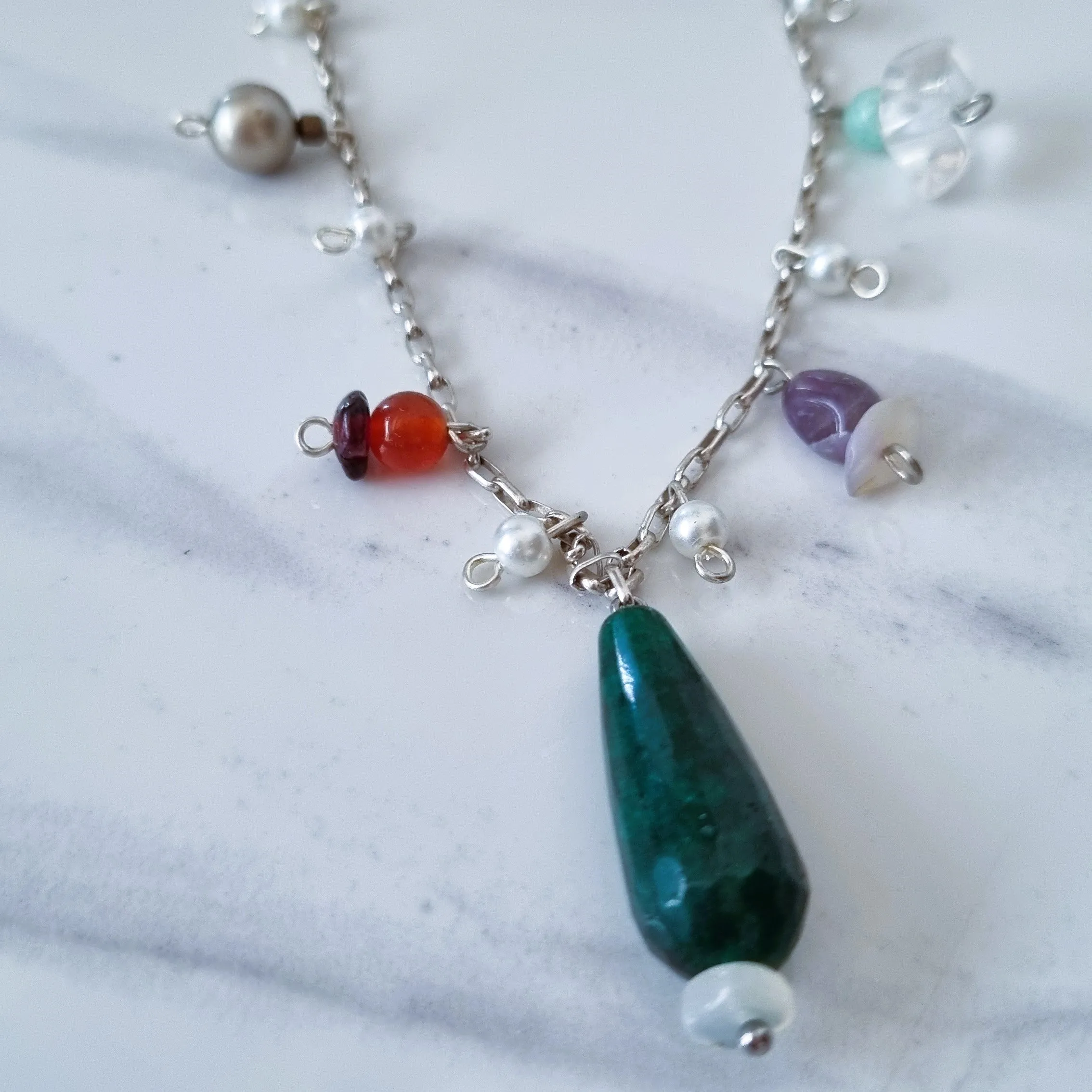 Silver and charms necklace