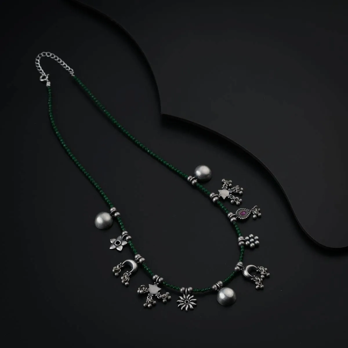 Silver Charms Motifs Necklace with Green Onyx Stone