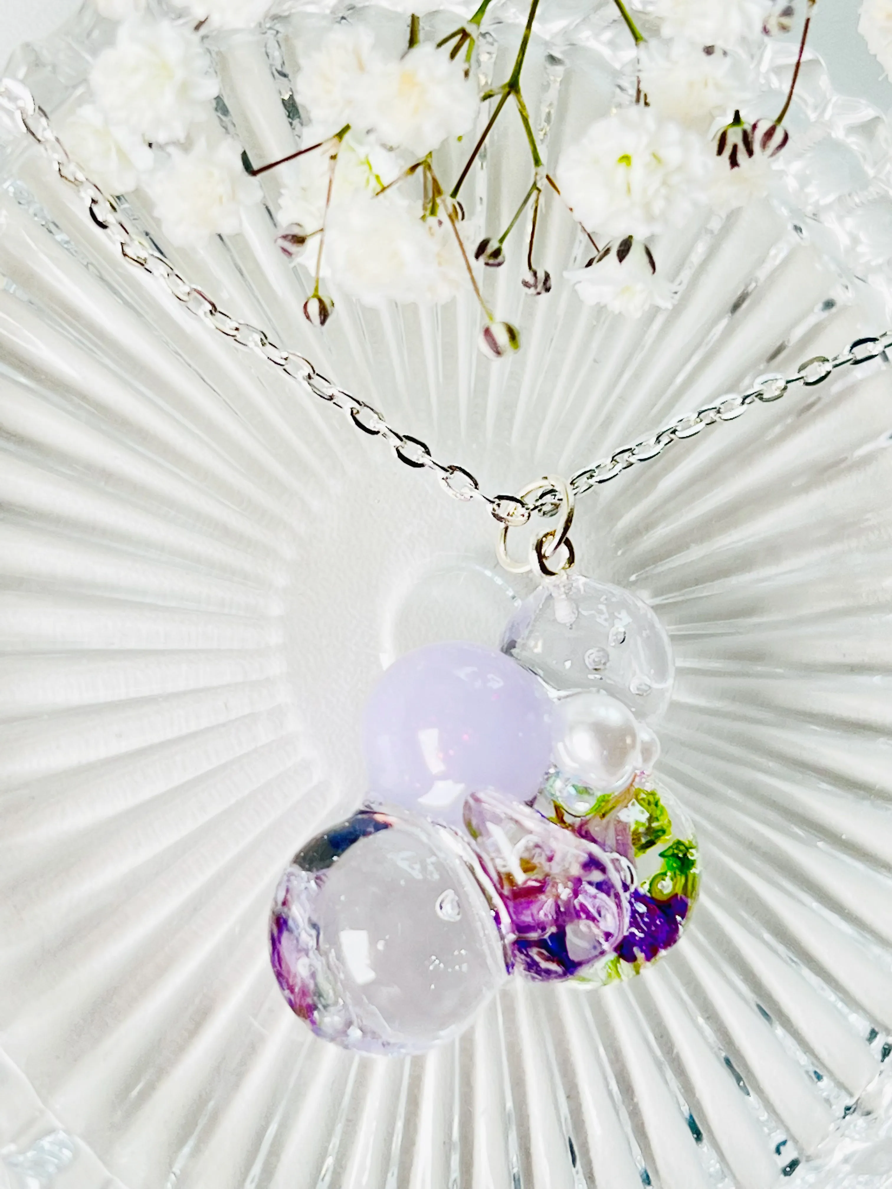 Sphere and flower necklaces